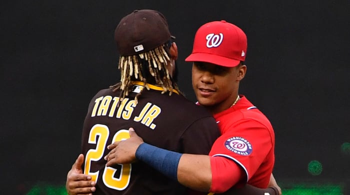 Washington Nationals left fielder Juan Soto (22) greets San Diego Padres shortstop Fernando Tatis Jr. (23) before a game at Nationals Park.